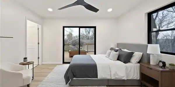 Image 4: Primary Bedroom with ensuite & access to deck