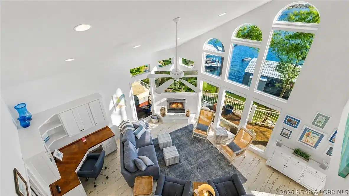 Image 1: Floor to Ceiling epic lake views!