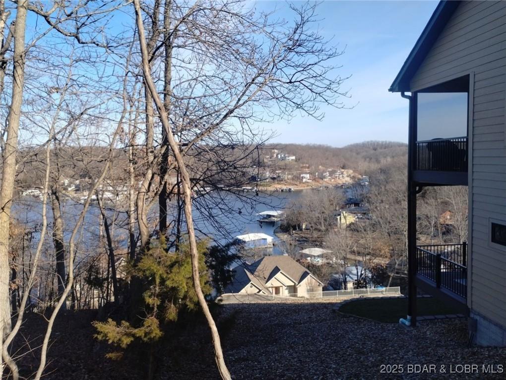 Image 2: Lake view from right side of lot near neighbor's h