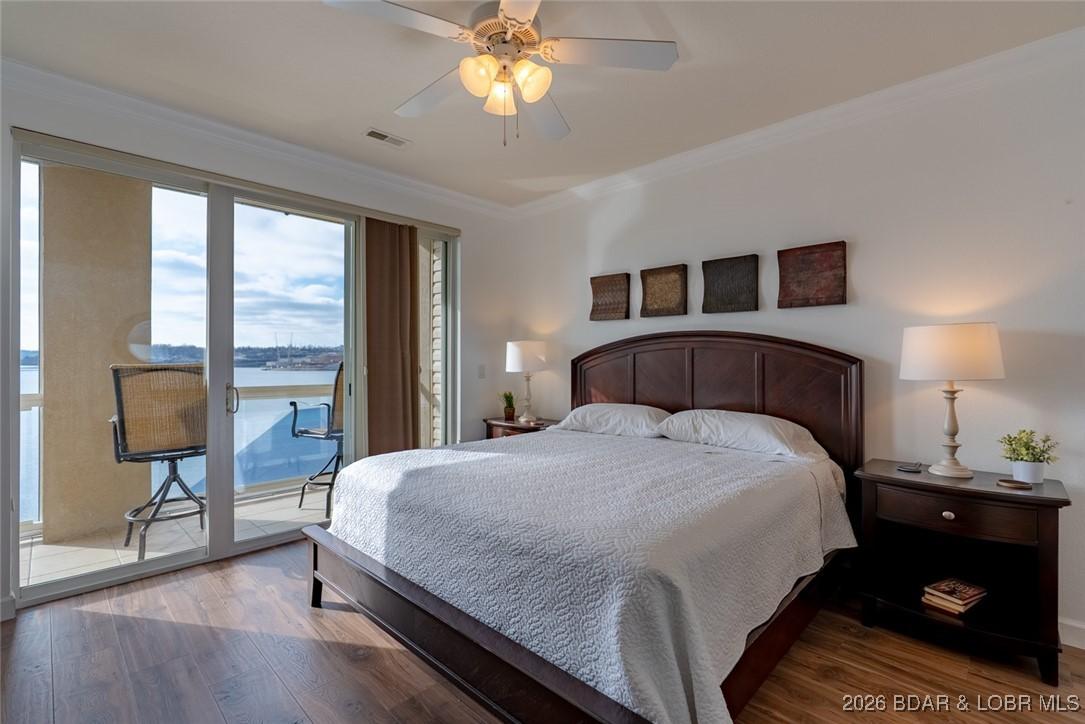 Image 3: Beautiful lake views from the Primary Bedroom