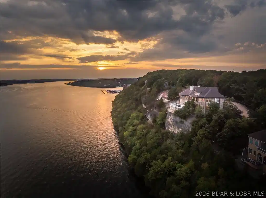 Image 1: The bluff location offers unrivaled views of the m