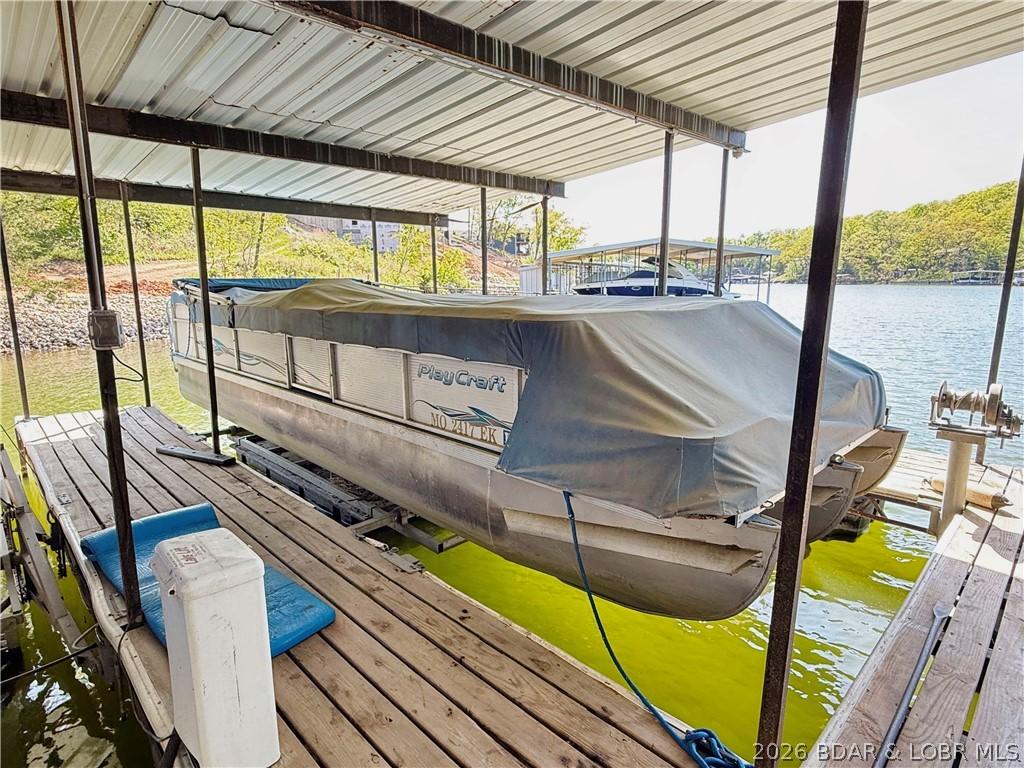 Image 4: 10X24 boat slip included, boat available for addit