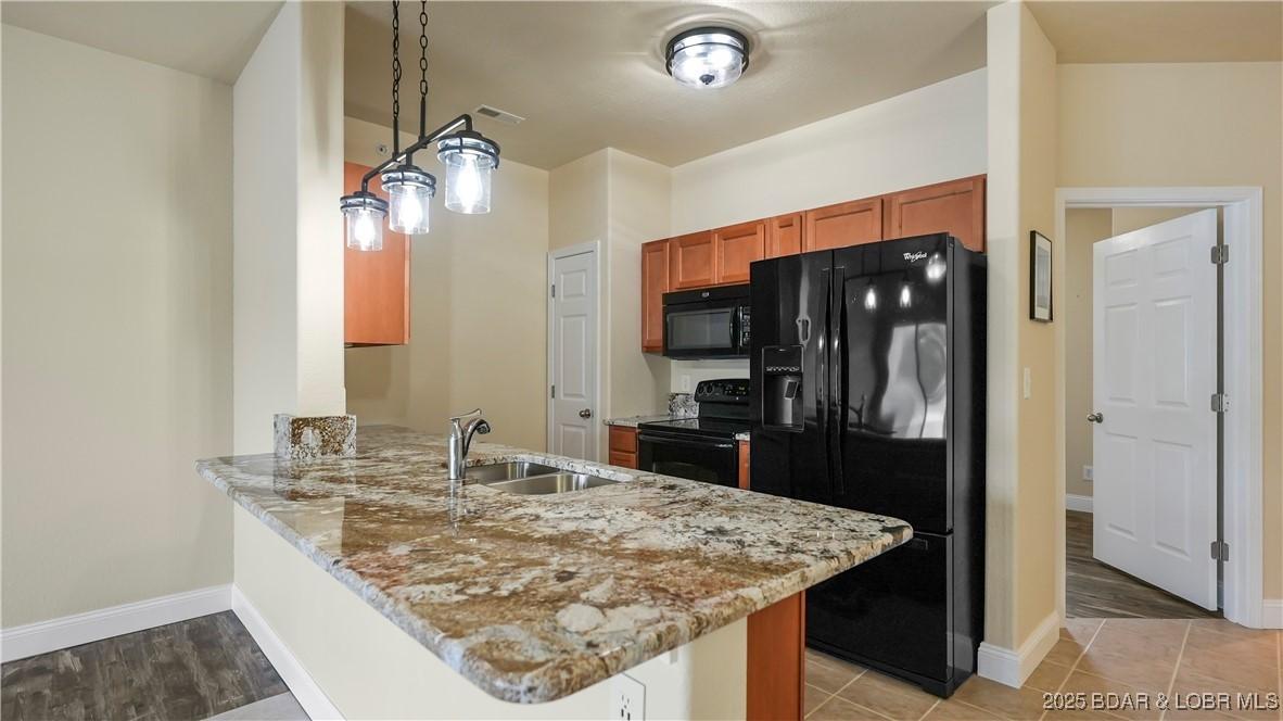 Image 1: Love the granite countertop color!