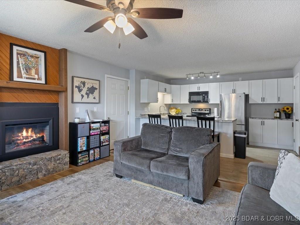 Image 2: Living Room with Thoughtful Decor & Walk-Out Acces