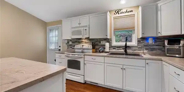 Image 3: Open Kitchen to Living Room