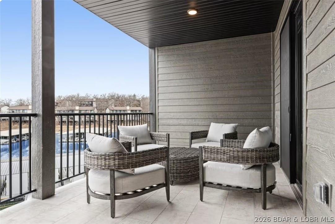 Image 4: Large covered deck is perfect for lakeside loungin