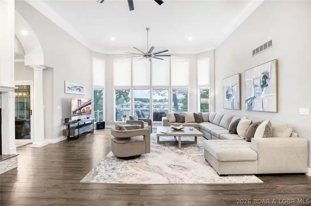 Image 1: The open living room greets you the moment you ste