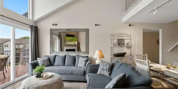 Image 3: Vaulted Ceilings with Large windows allowing Natur
