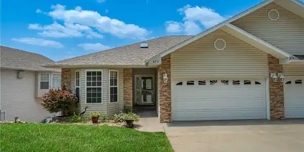 Image 3: Left side of the duplex with level driveway