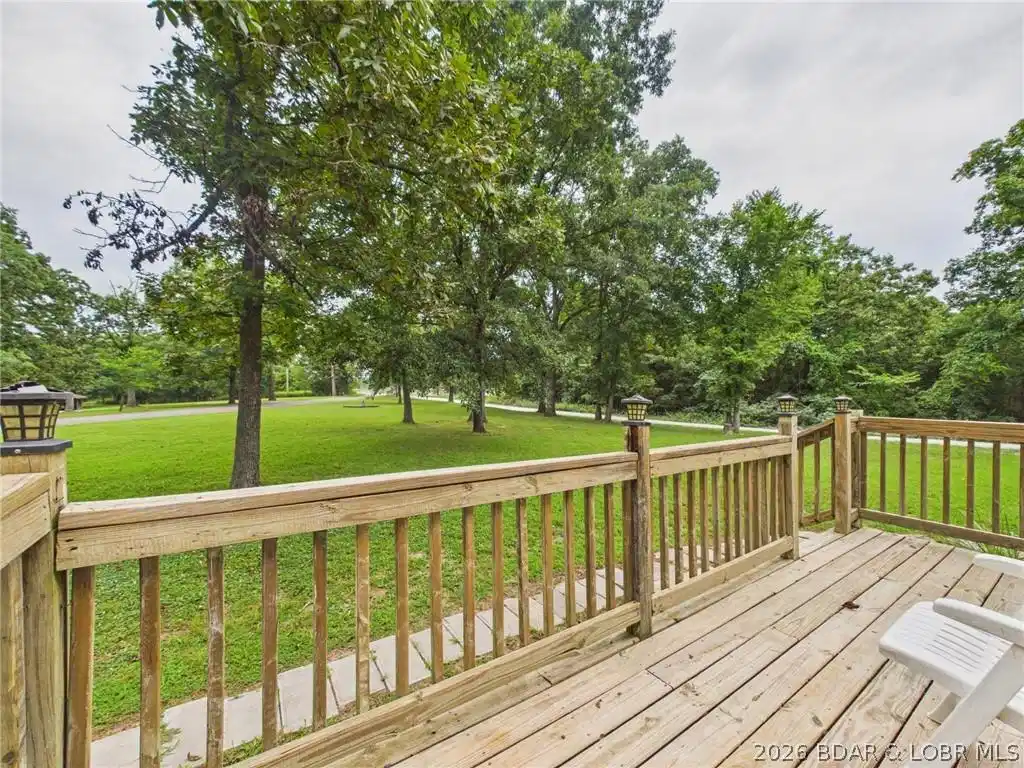 Image 1: Overlooking the front yard from the front deck.