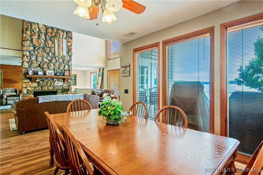 Image 4: Dining area is well lit and has some great lakesid