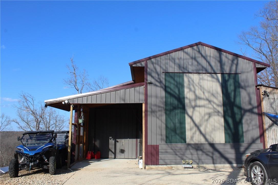 Image 1: Garage on the top of the hill