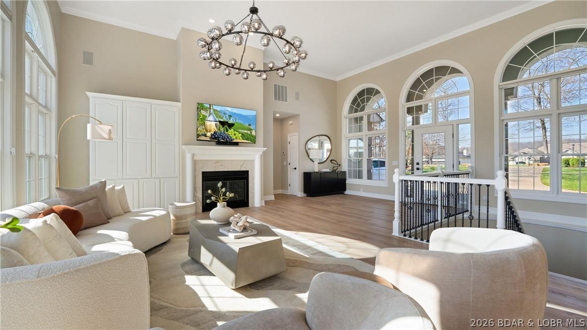 Image 3: Stunning mediterranean style windows flank the roa