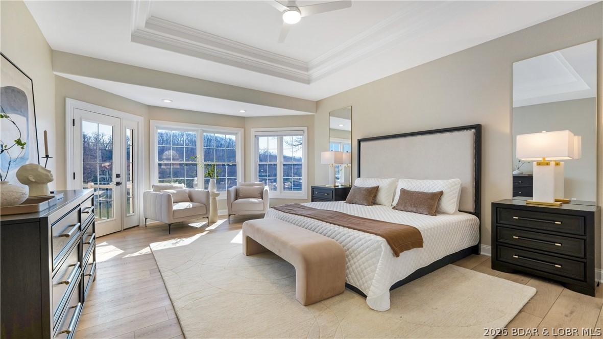 Image 4: Spacious master suite with easy access to upper de
