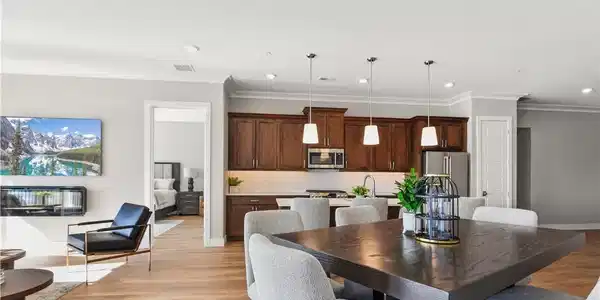 Image 2: The tall ceilings and light color palette help add