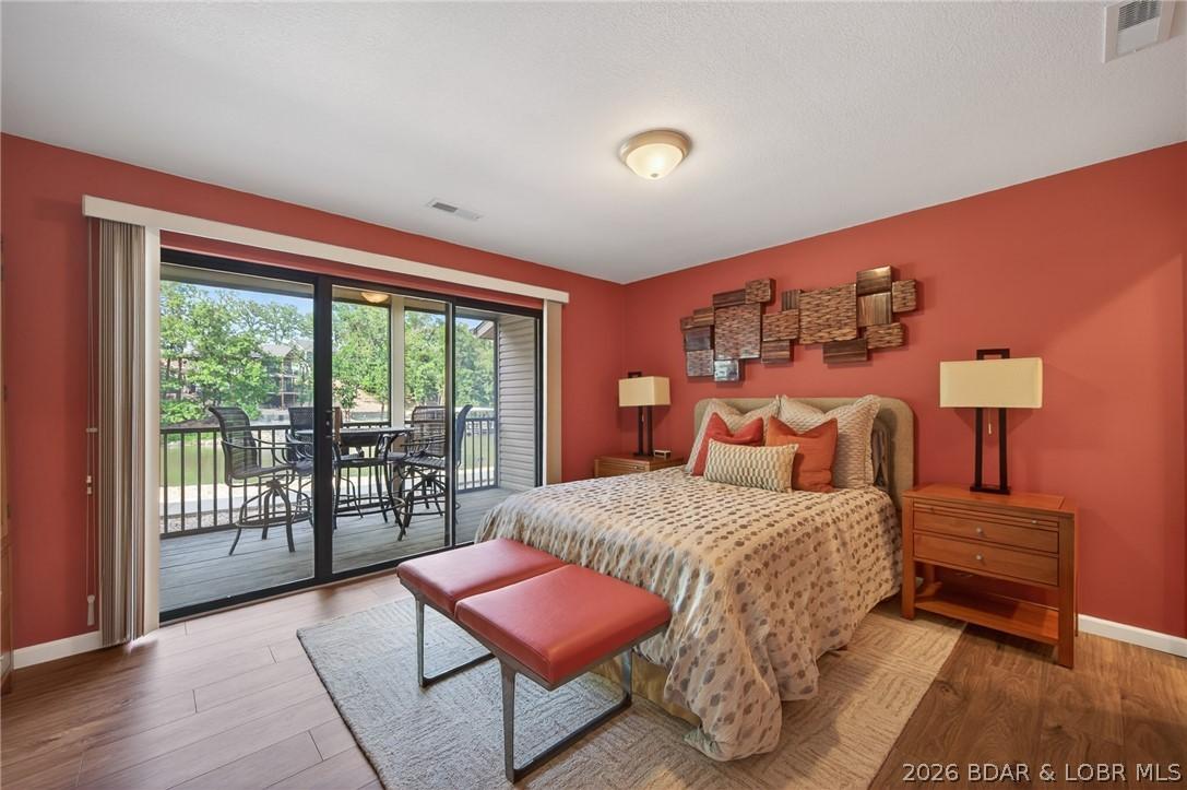 Image 4: Elegant Master bedroom with direct access to the s