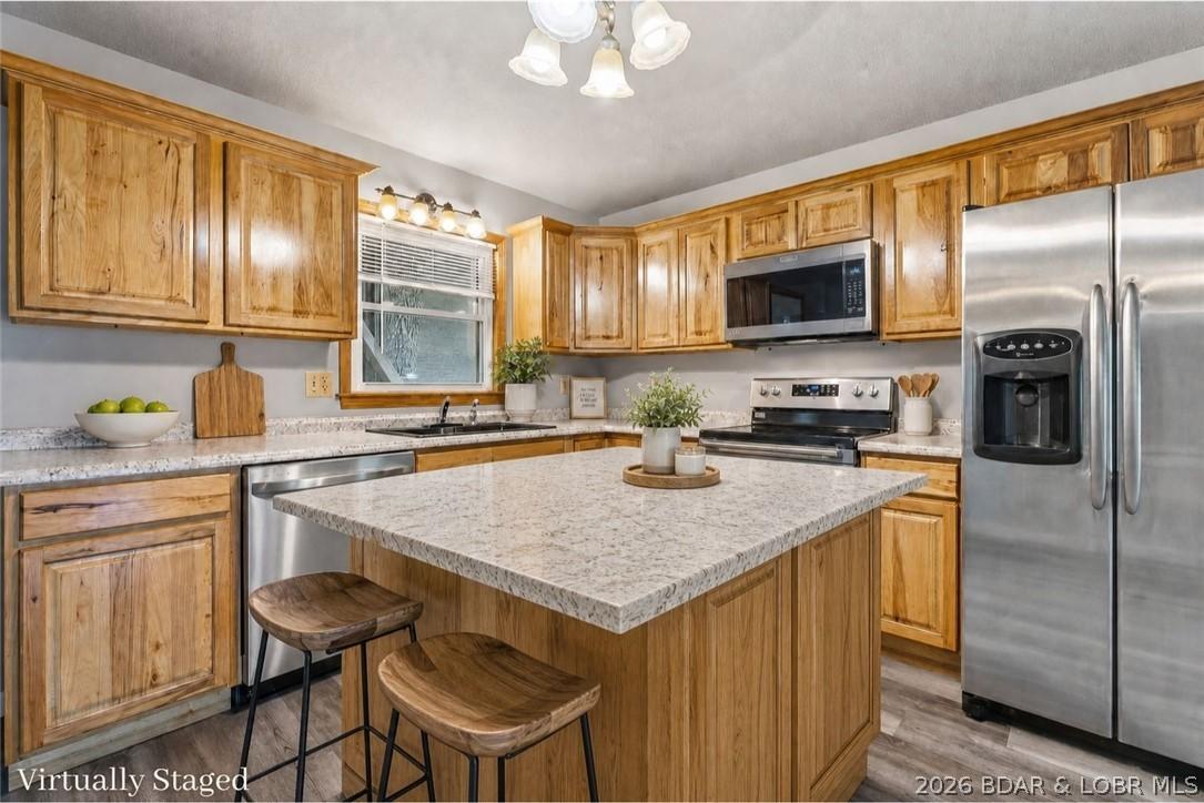 Image 1: Adding a Kitchen Island would increase storage, se