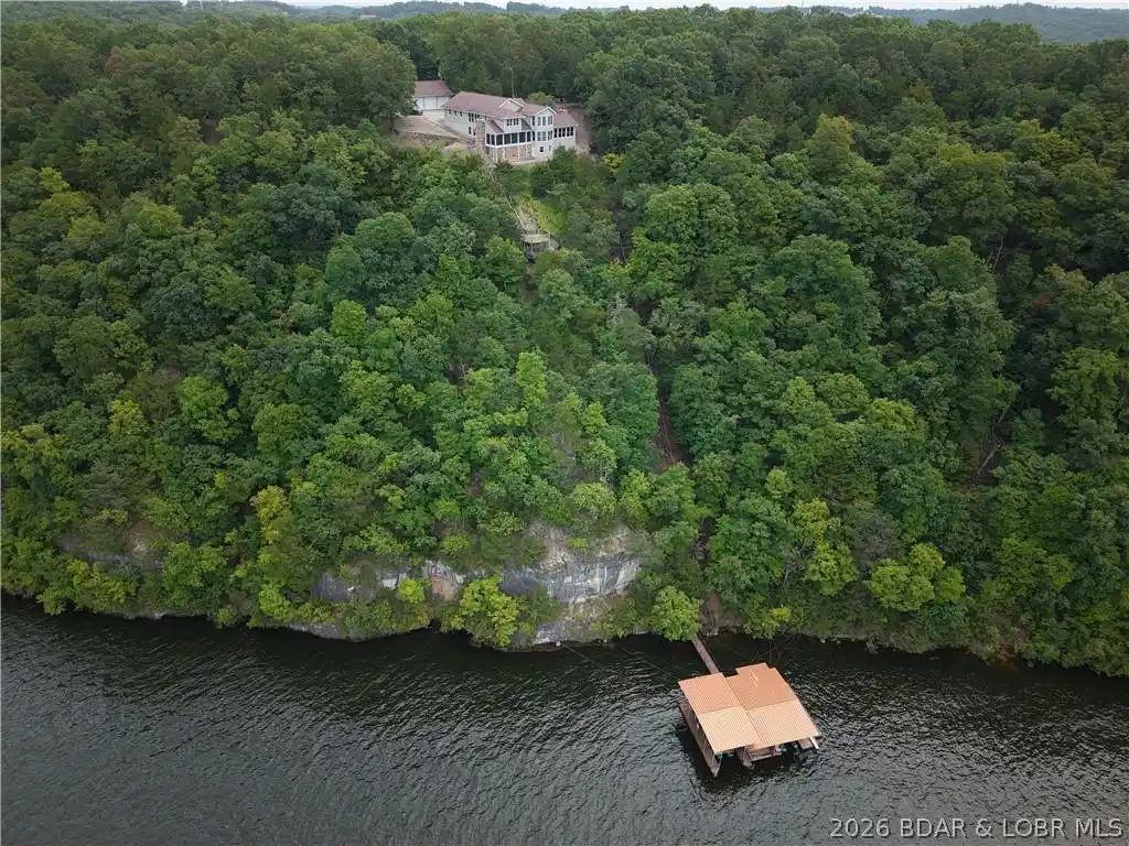 Image 1: Enjoy true lakefront living with incredible bluff-