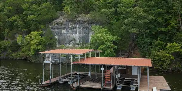 Image 3: Tucked beneath the bluff along the wooded shorelin