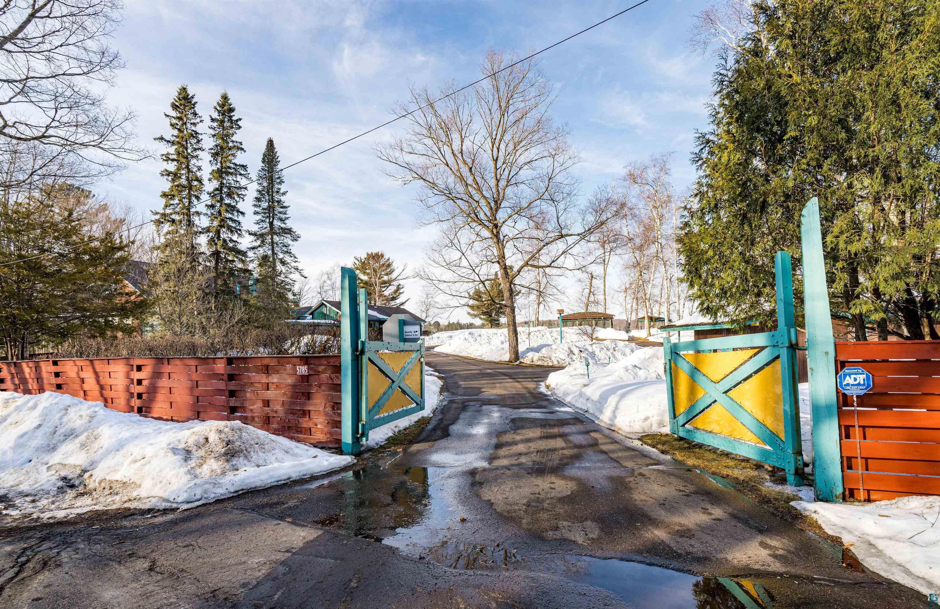 Image 2: View of snow covered gate, Fence