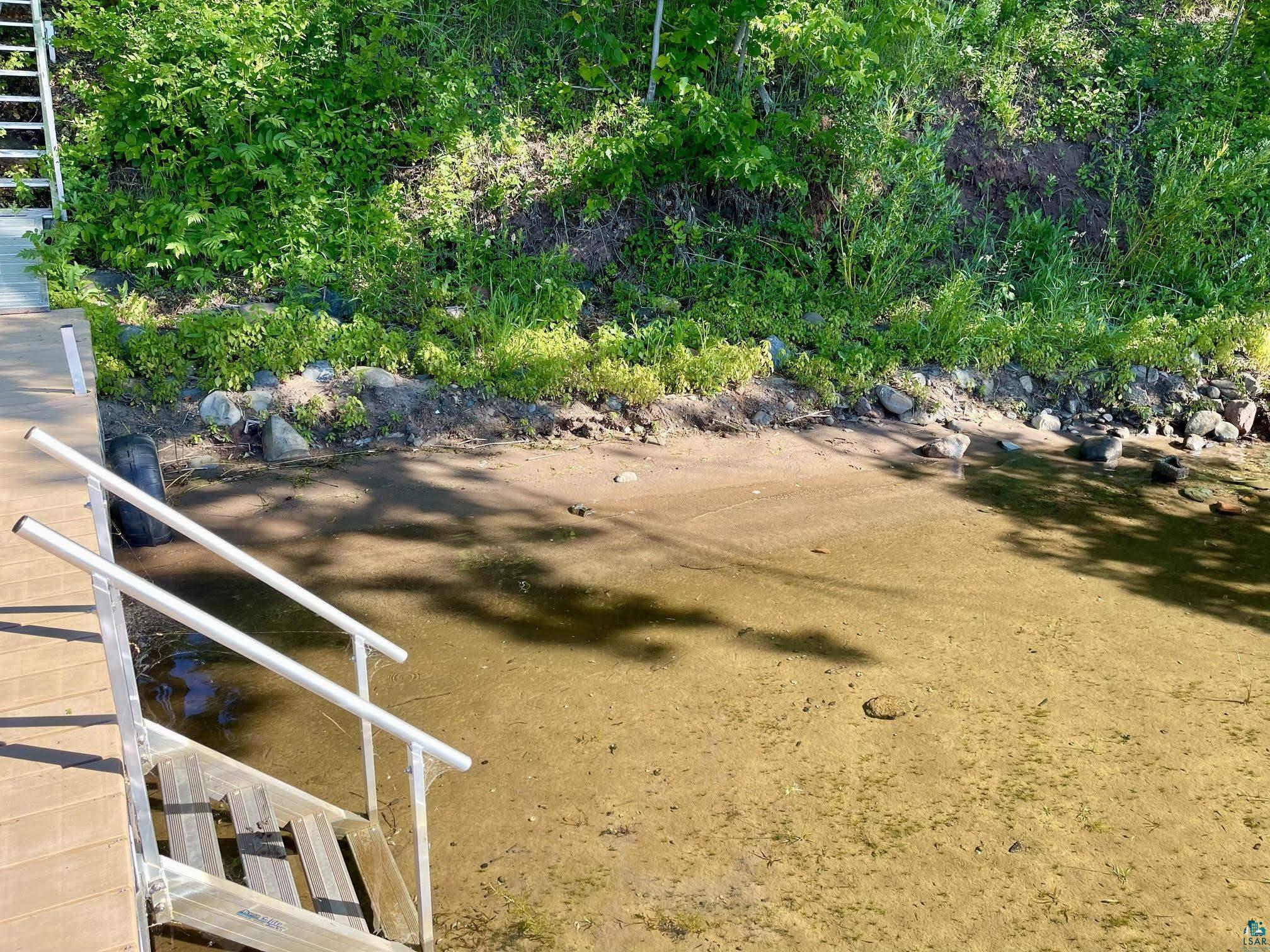 Image 2: Sandy bottom & beach.