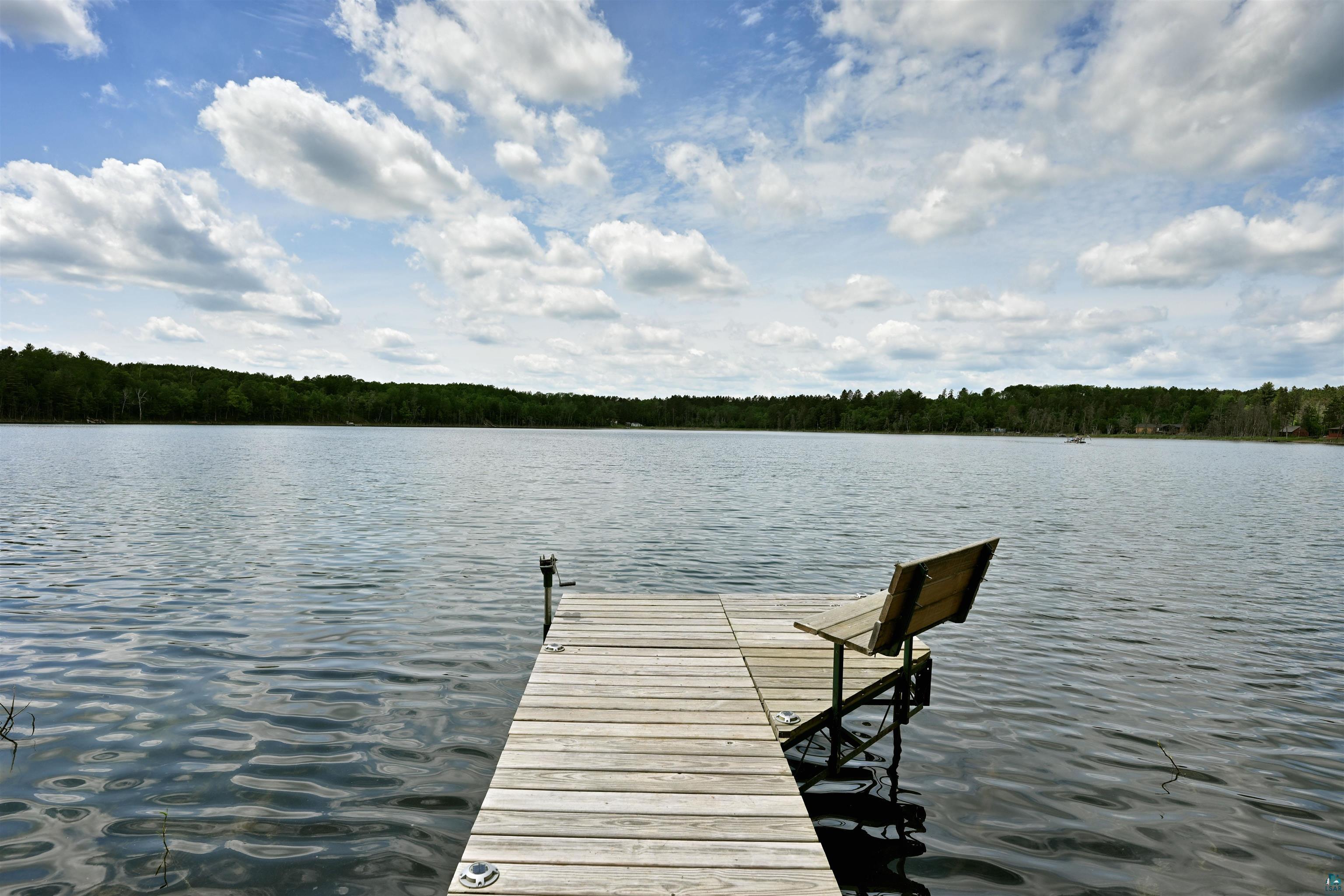 Image 2: Dock area with a water view and a forest view, Dock