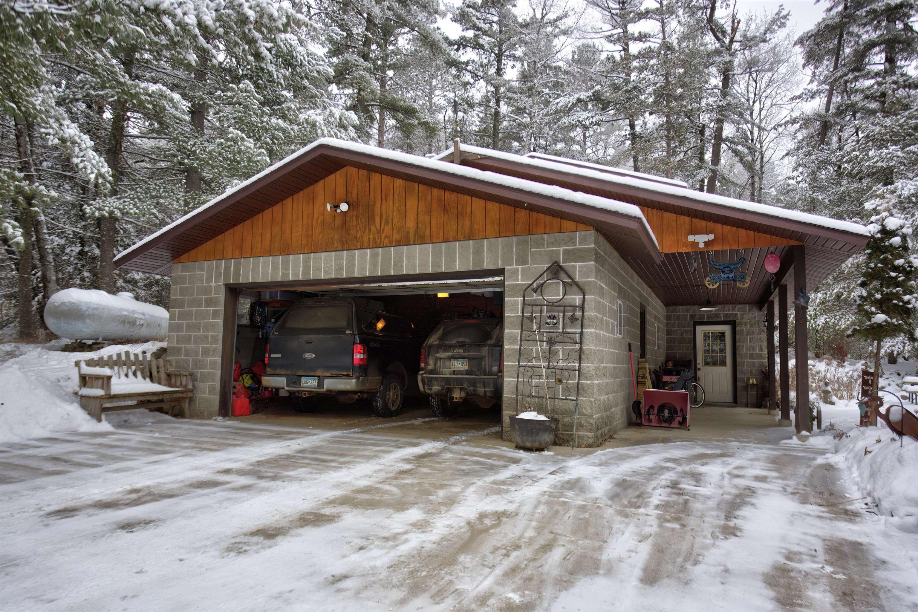 Image 3: View of snow covered garage, Garage