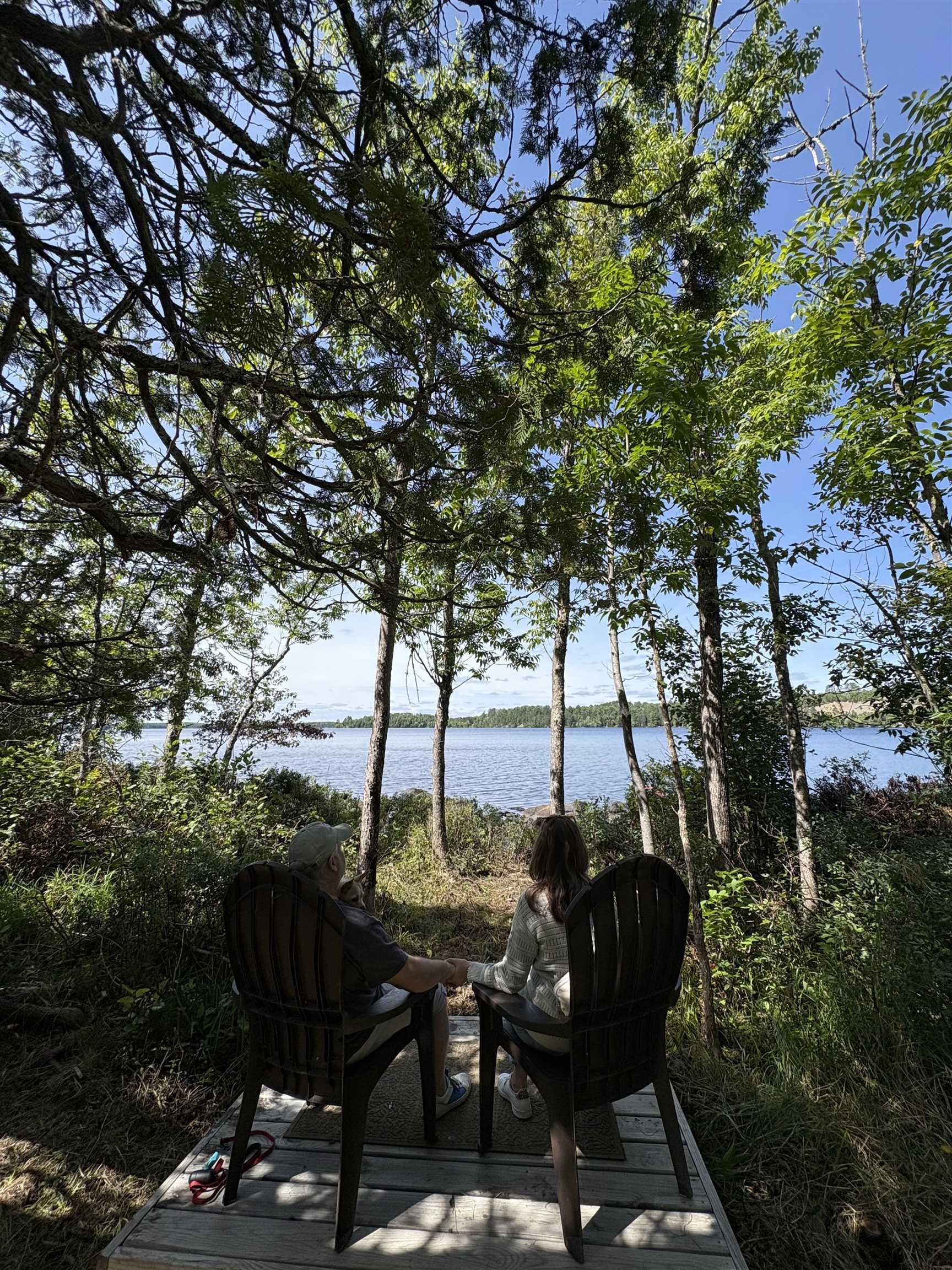Image 2: Deck featuring a water view, Deck