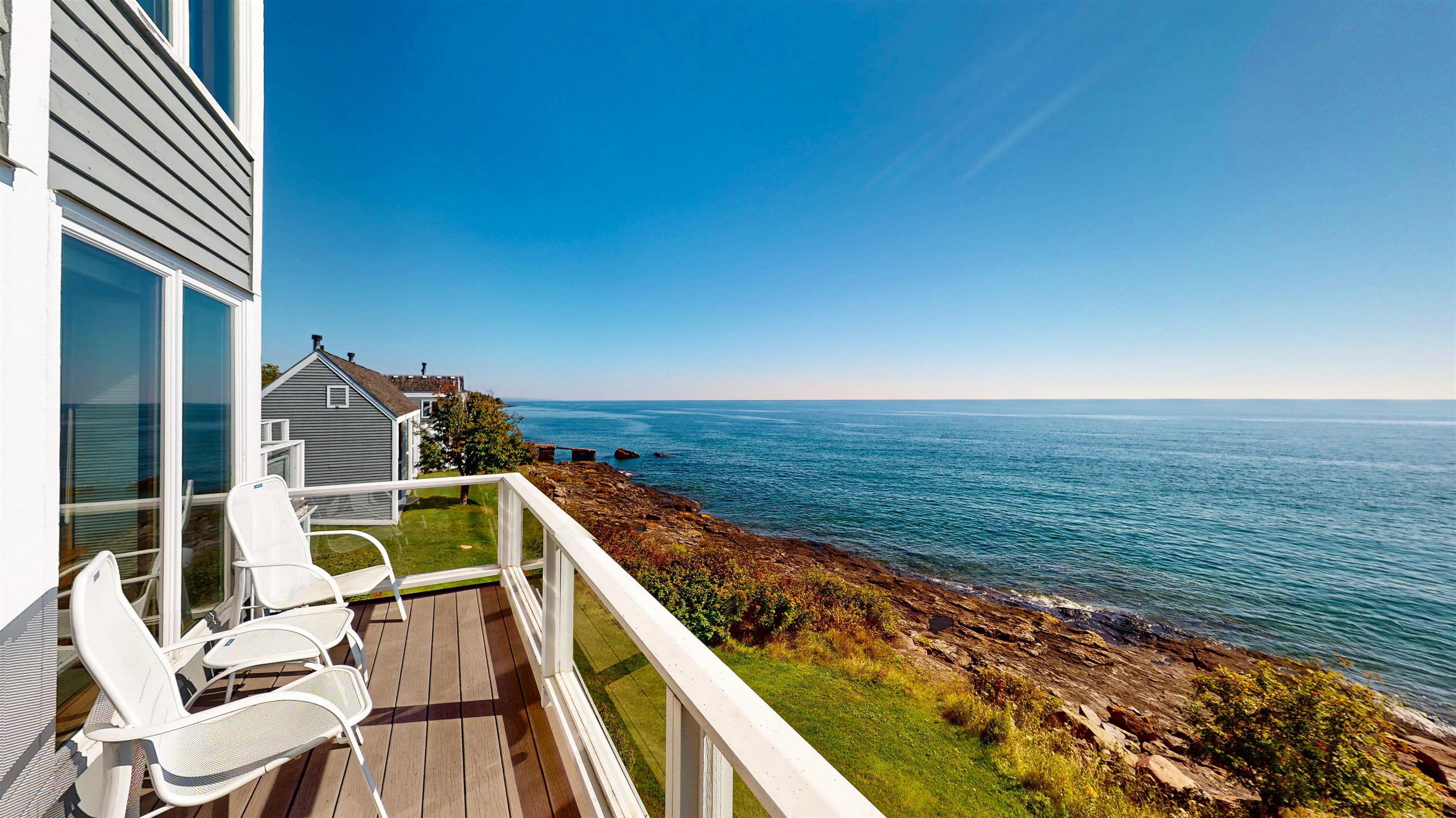 Image 1: Balcony featuring a water view, Balcony