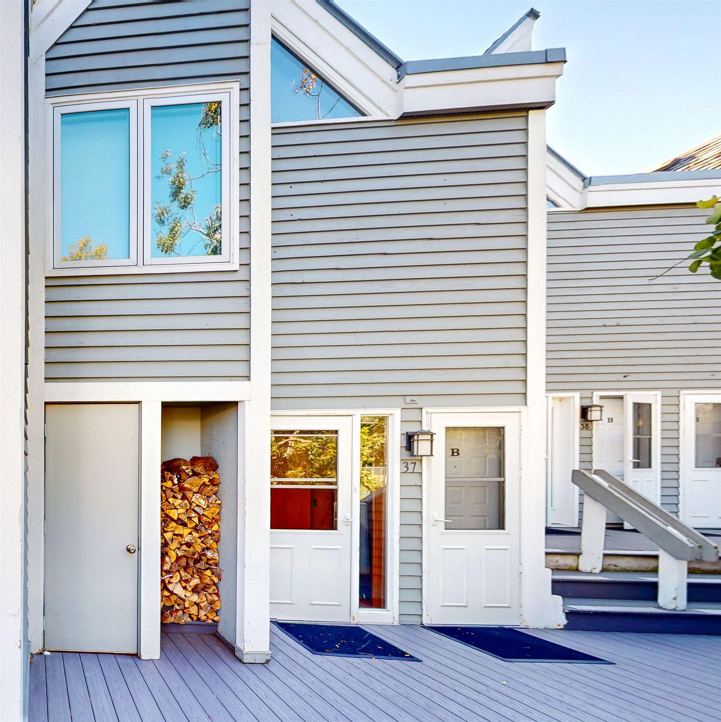 Image 2: Entrance to property featuring a wooden deck, Entry