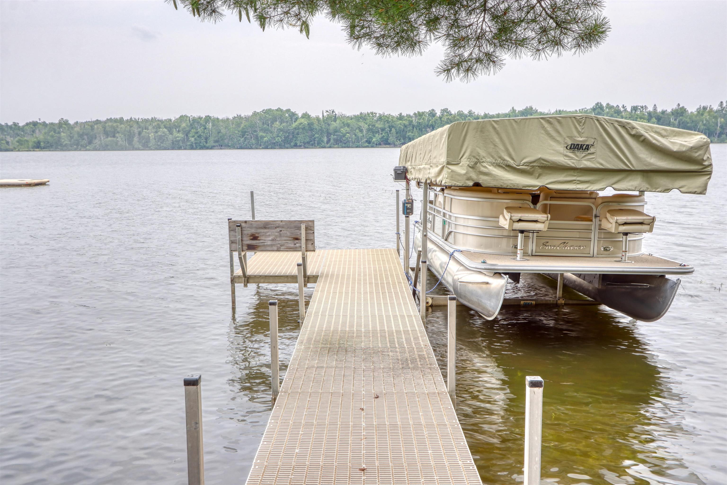 Image 2: Dock featuring a water view, Dock