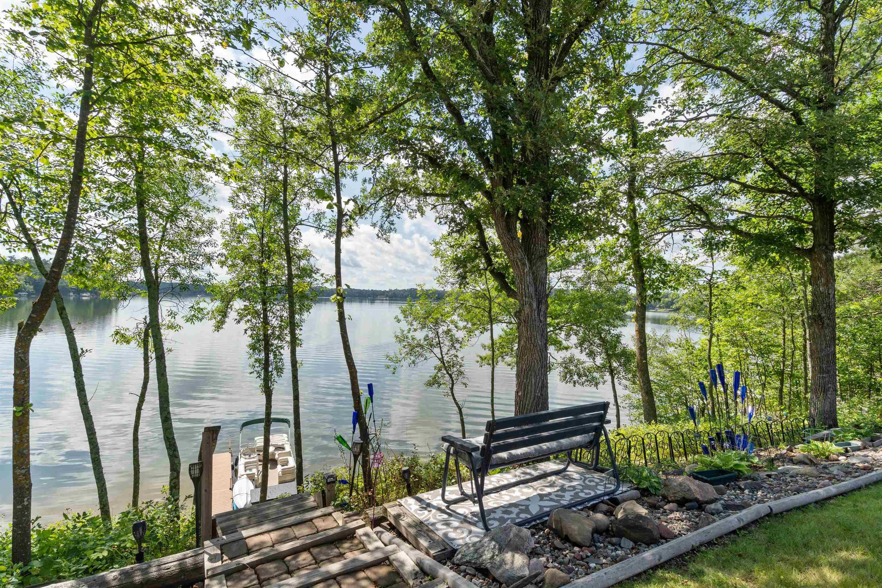 Image 1: Water view featuring a dock, View