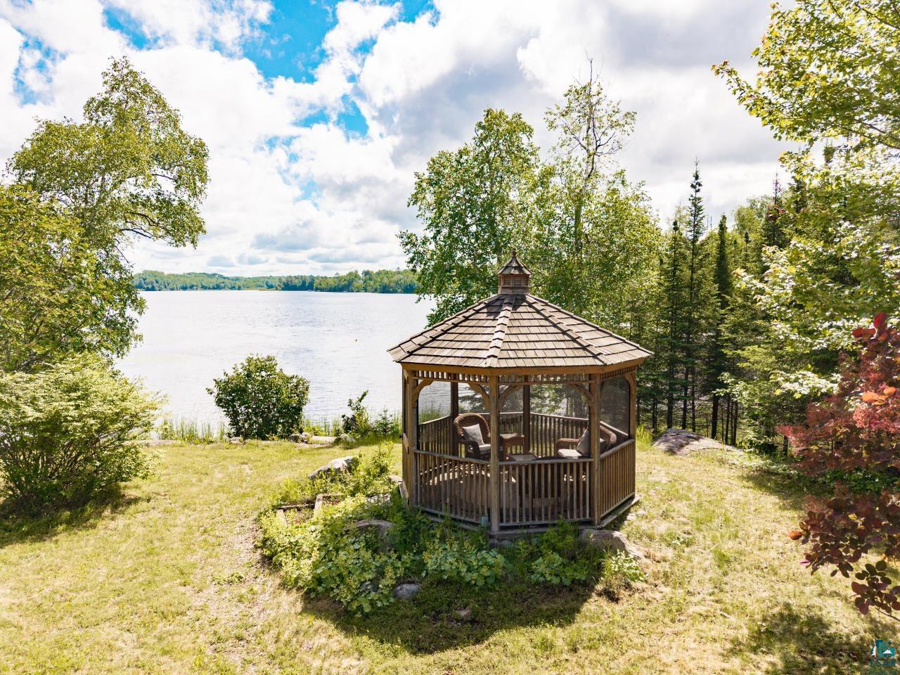 Image 2: Lakeside screened gazebo., Gazebo