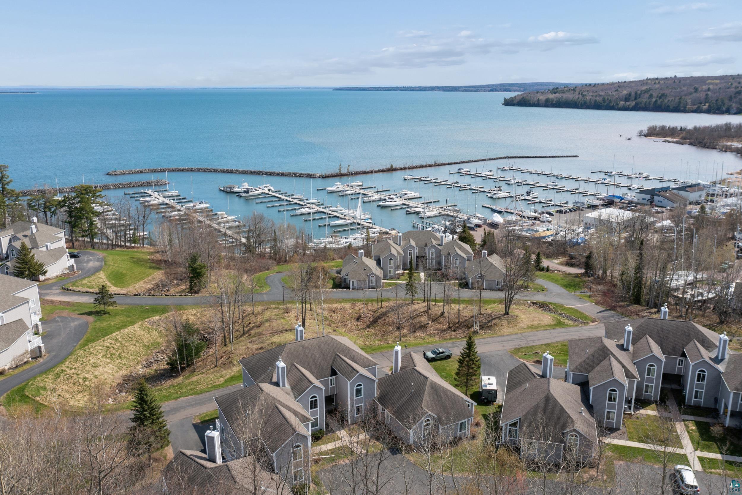 Image 0: Aerial perspective showcasing marina with numerous boats, Aerial View