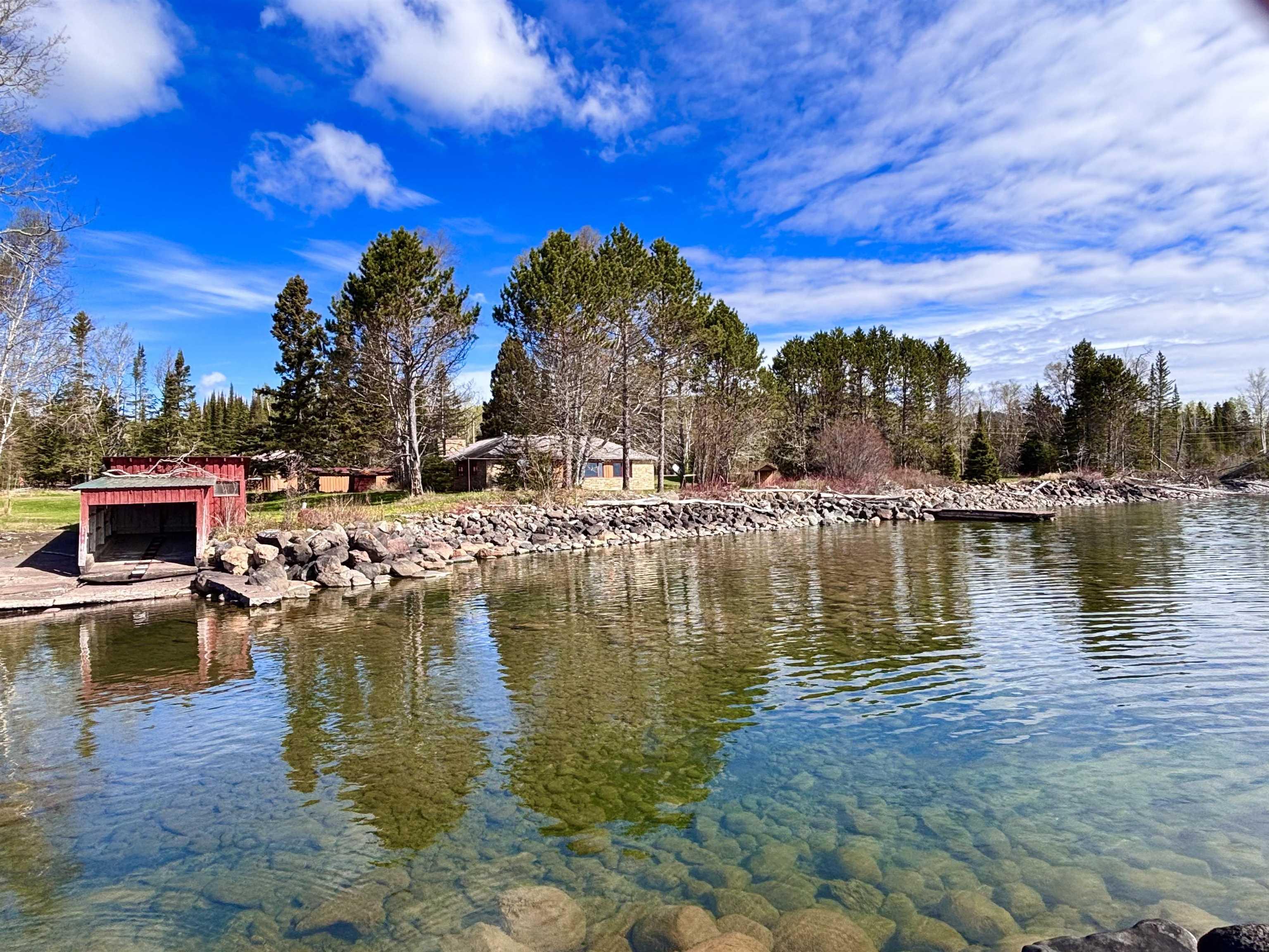 Image 2: Water view with a dock, Boat House