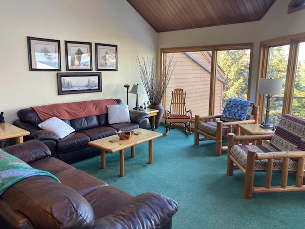 Image 2: Living room with carpet floors, wooden ceiling, and vaulted ceiling, Living Room