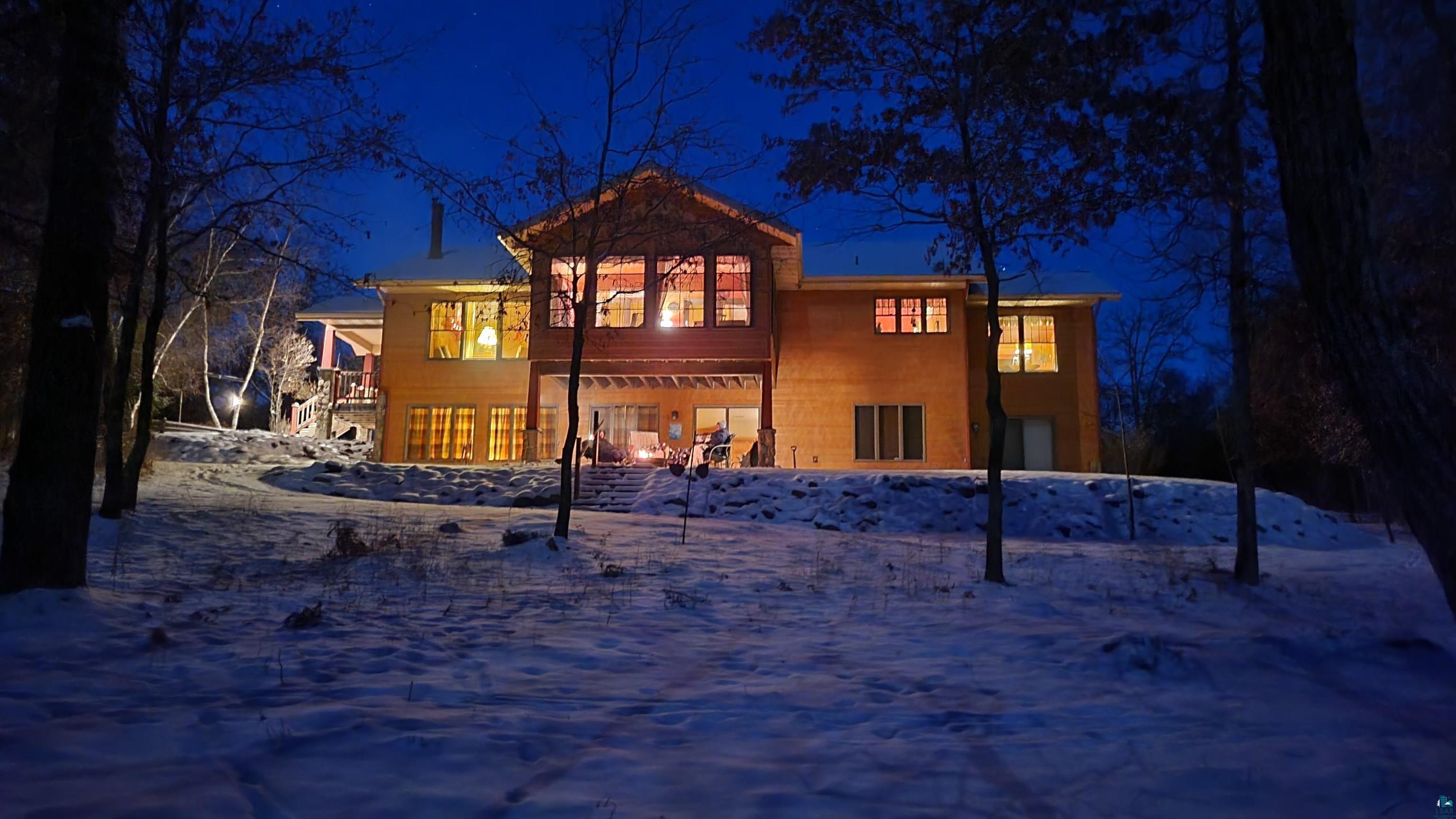 Image 1: View of snow covered rear of property, Back Of Structure