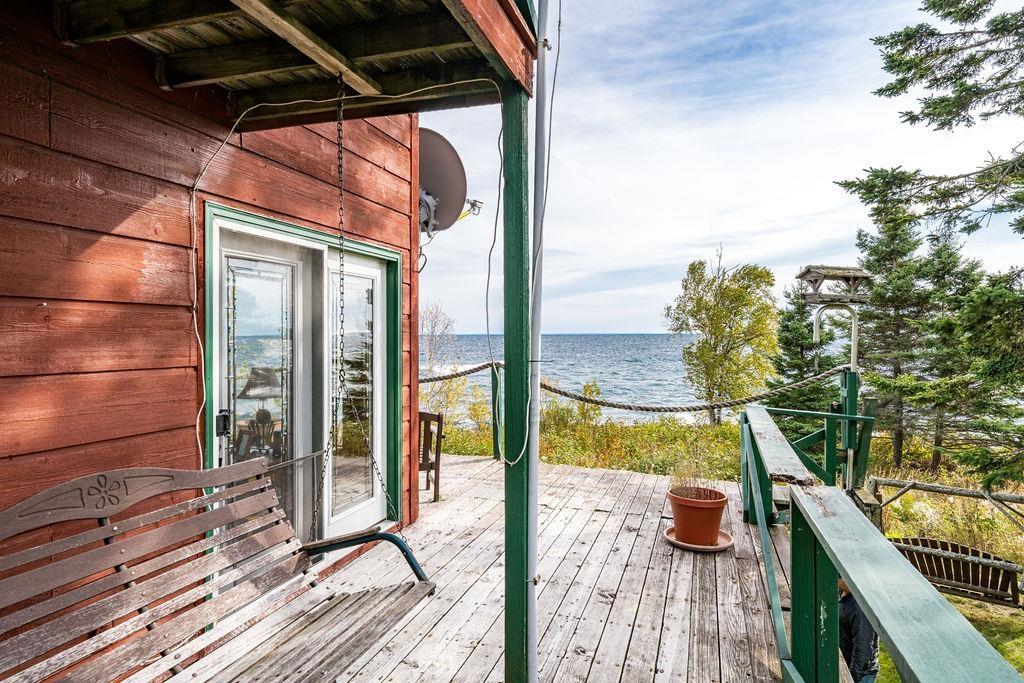 Image 3: Wooden terrace with a water view, Deck