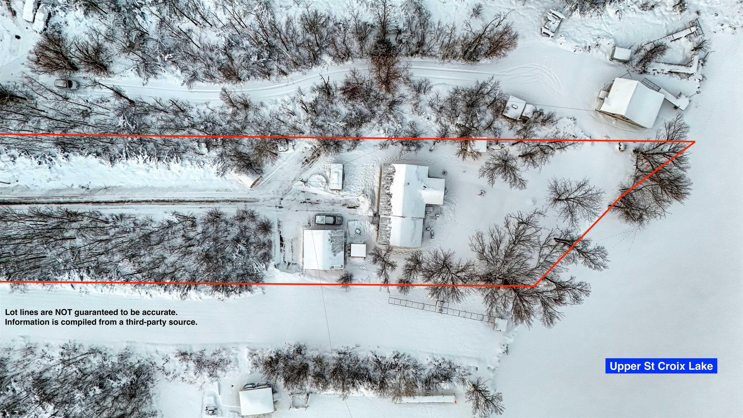 Image 3: Snowy aerial view with property parcel outlined, Aerial View