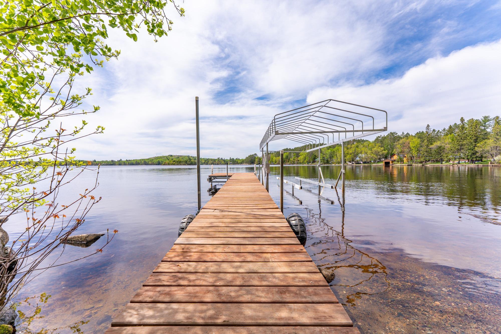 Image 3: Dock area featuring a water view, Dock