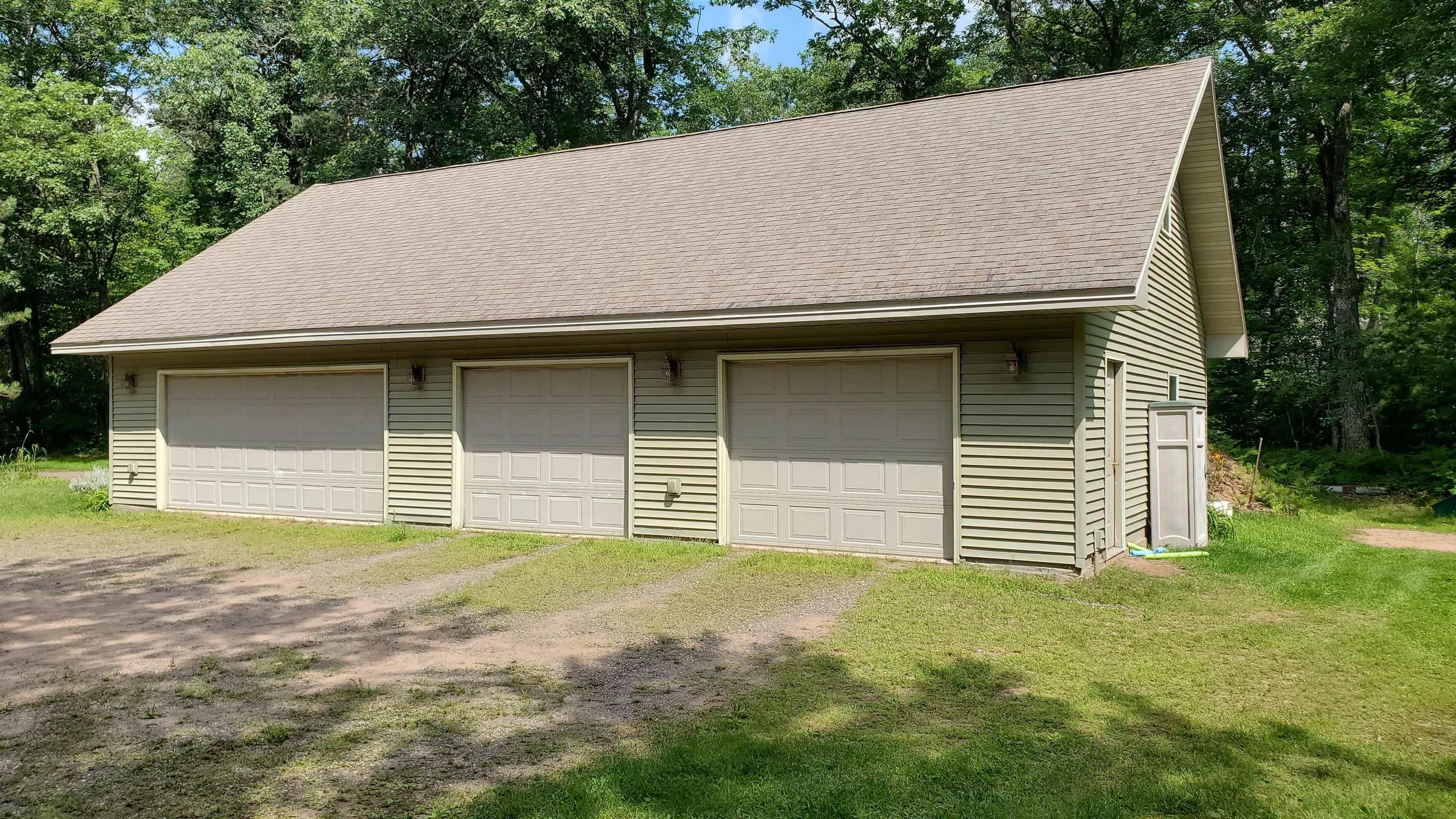 Image 1: A loft storage area spans the length of the building., 4 Stall Garage