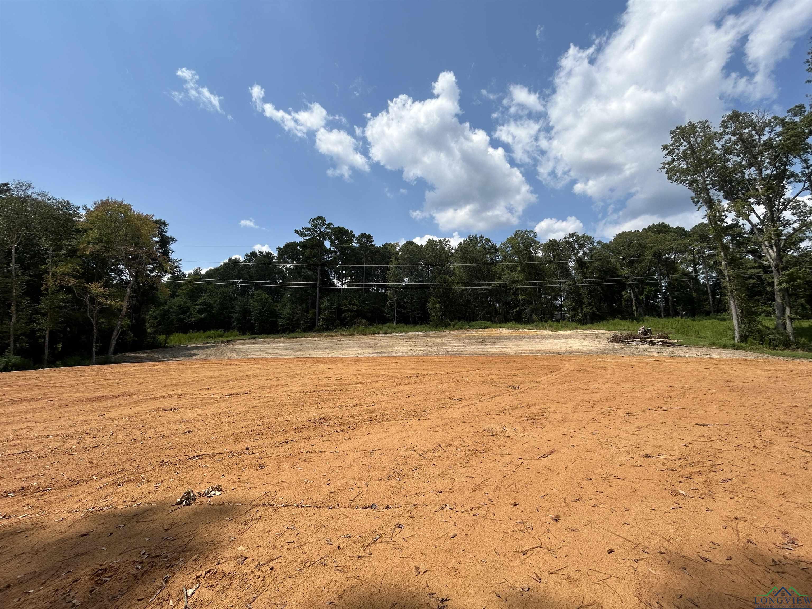 Image 3: View of community featuring a wooded view, Community