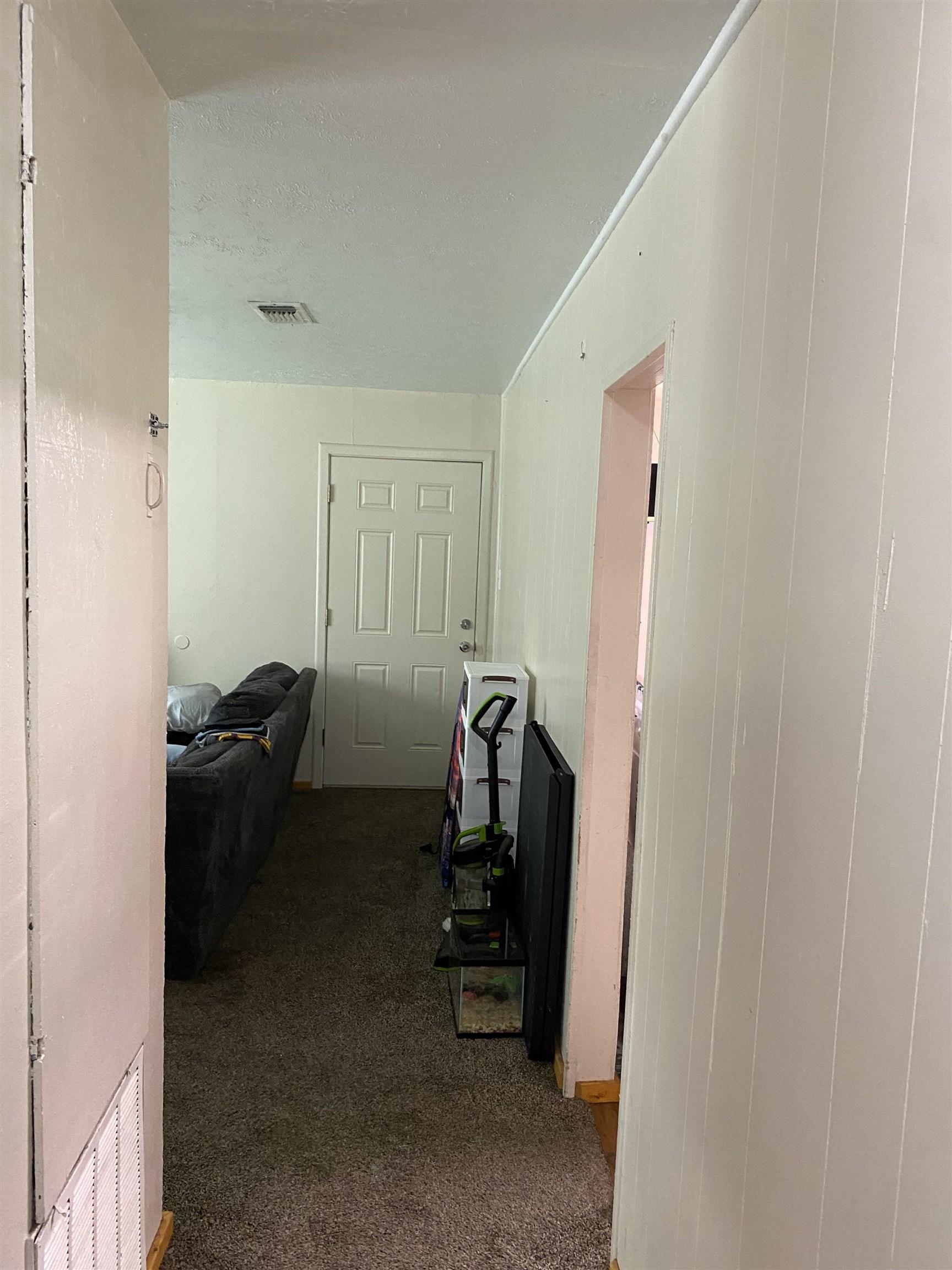 Image 1: Image quality insufficient for description, Hallway