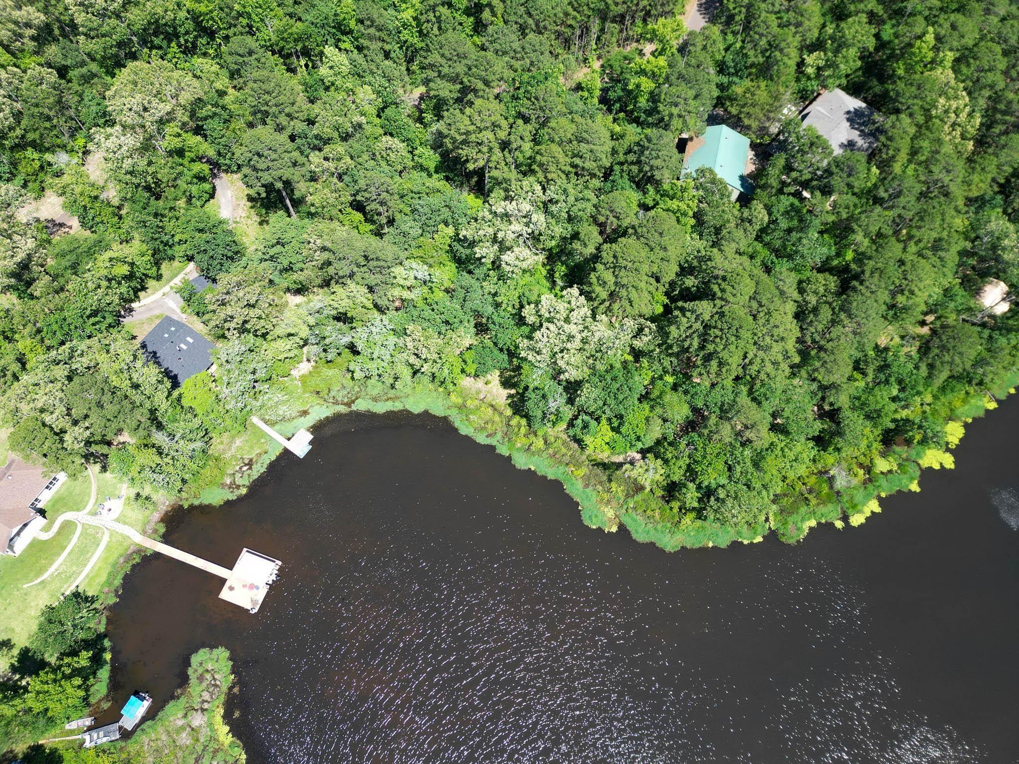 Image 3: Aerial view of property and surrounding area with a nearby body of water, Aerial View