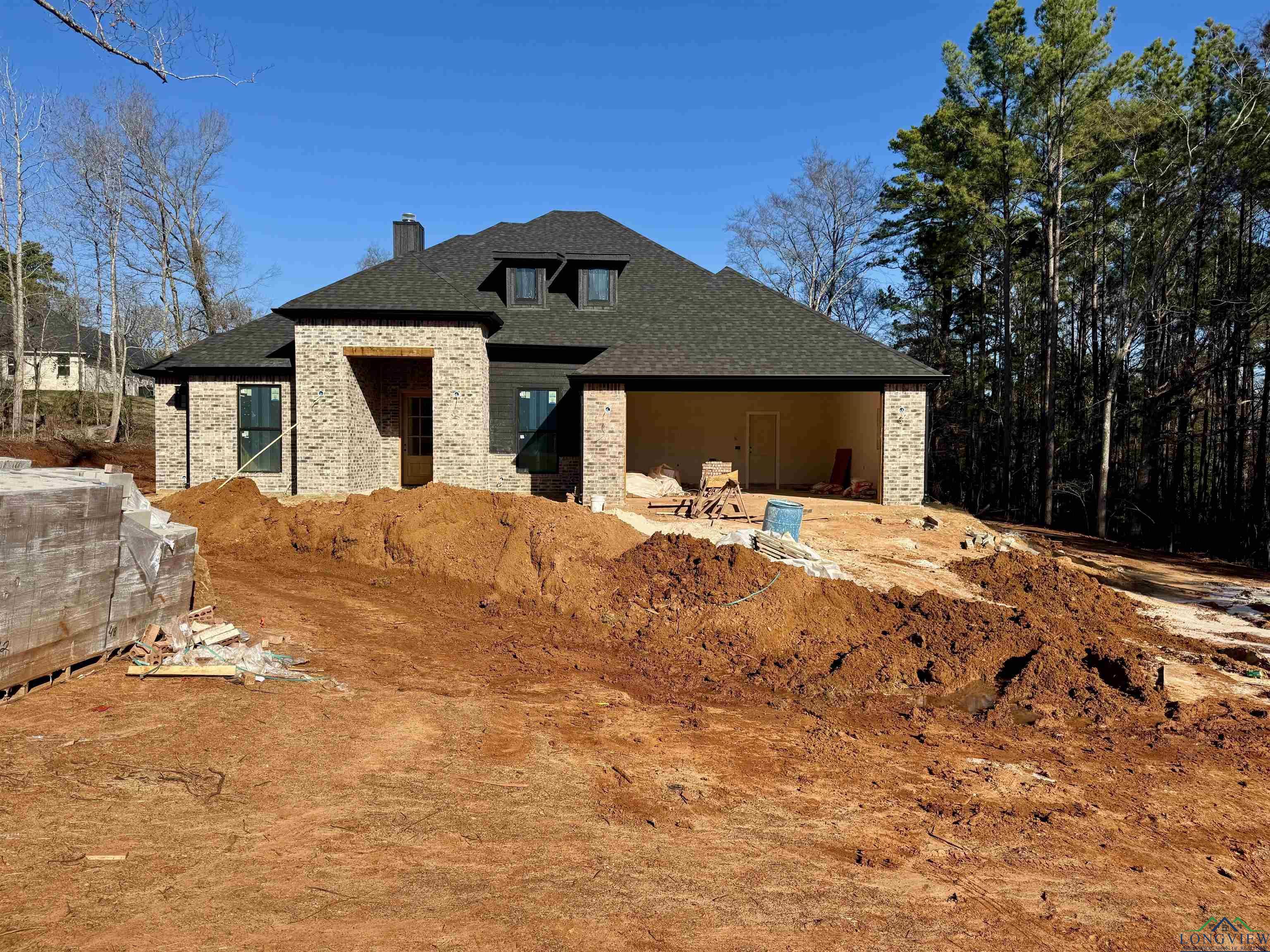 Image 1: View of front facade with an outdoor structure, Front Of Structure