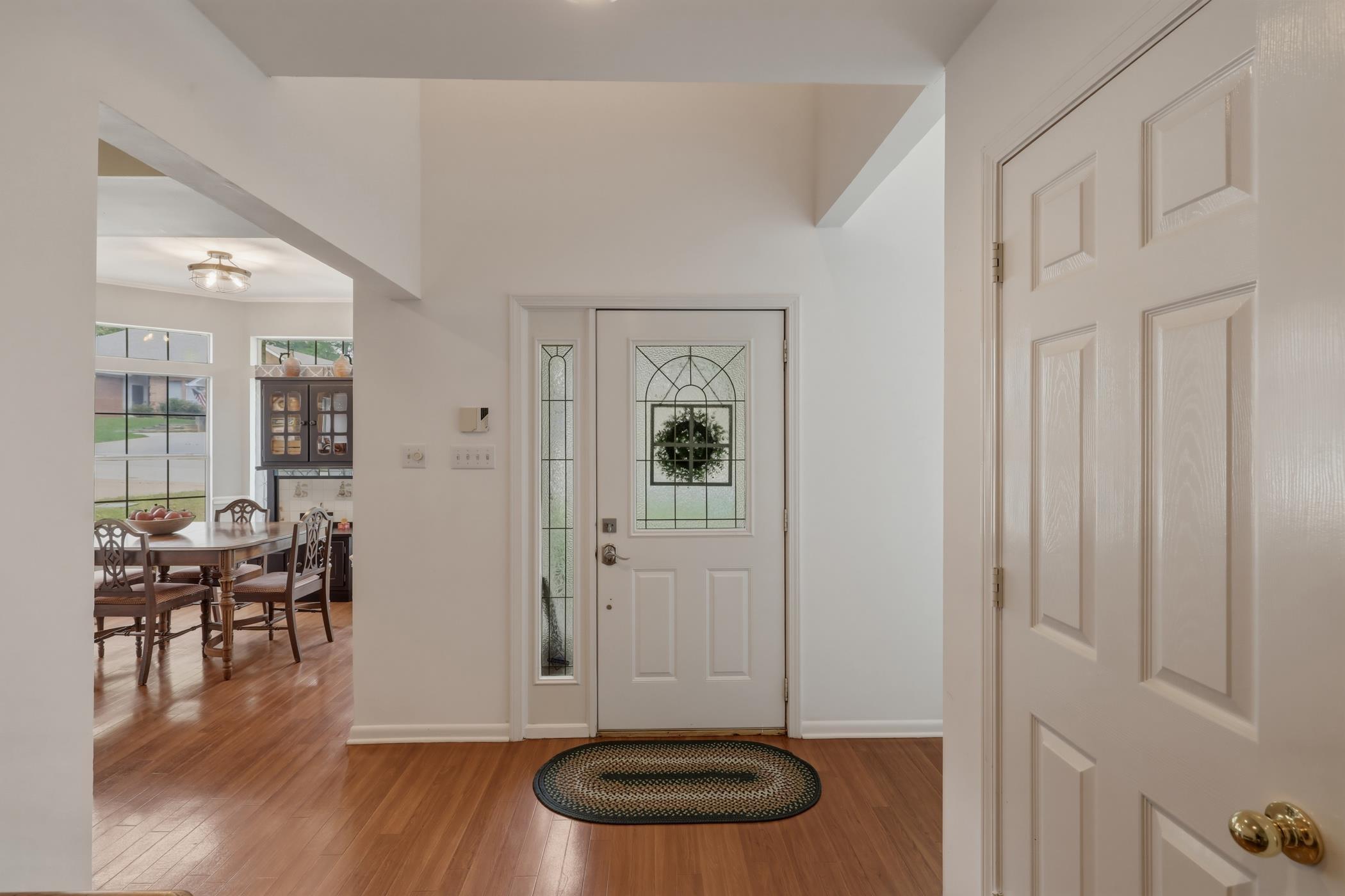 Image 1: Entryway featuring light wood-type flooring and baseboards, Entrance Foyer