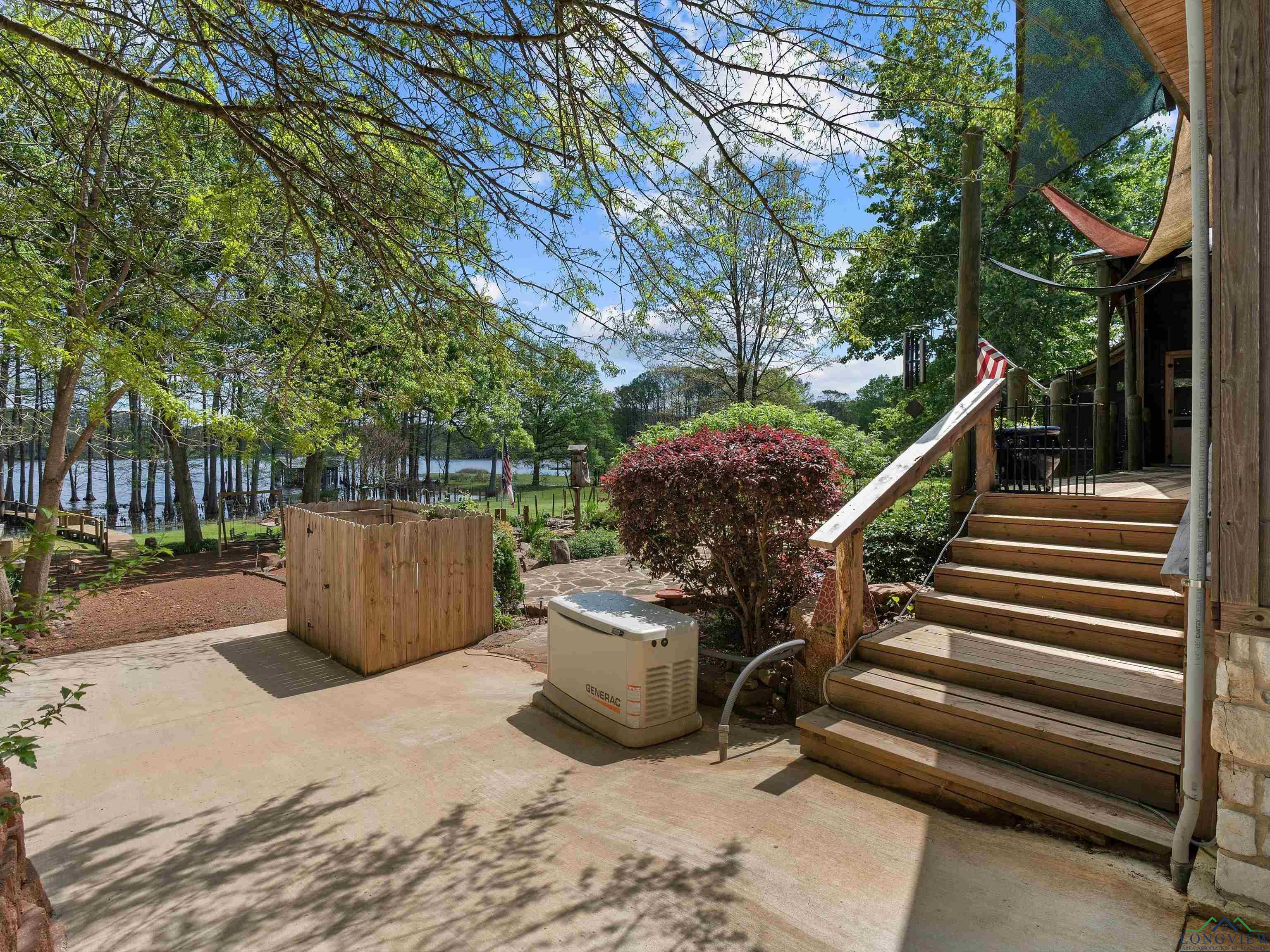 Image 3: View of patio with a water view and stairs, Patio
