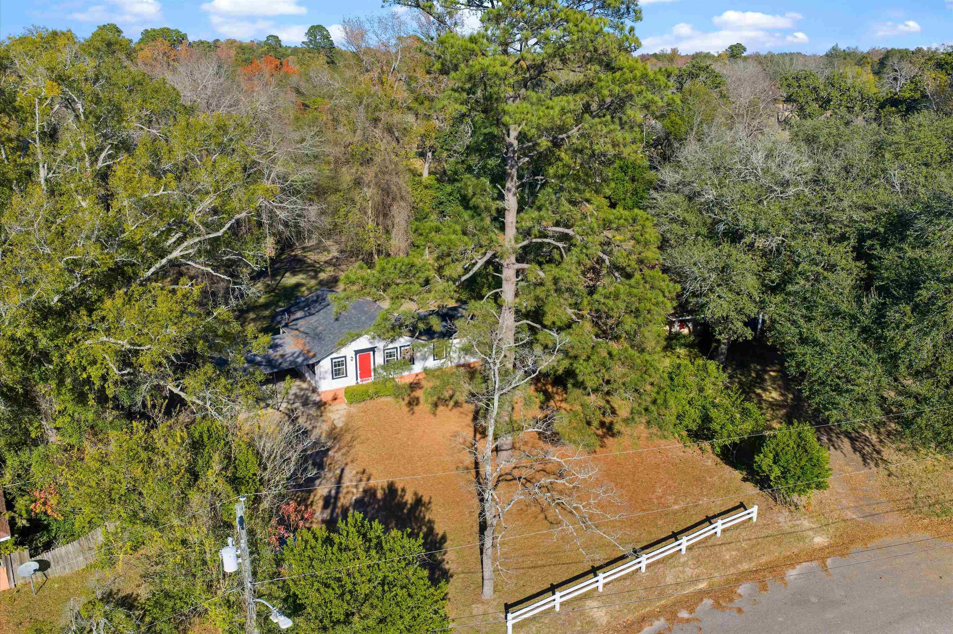 Image 2: Aerial view of a heavily wooded area, Aerial View