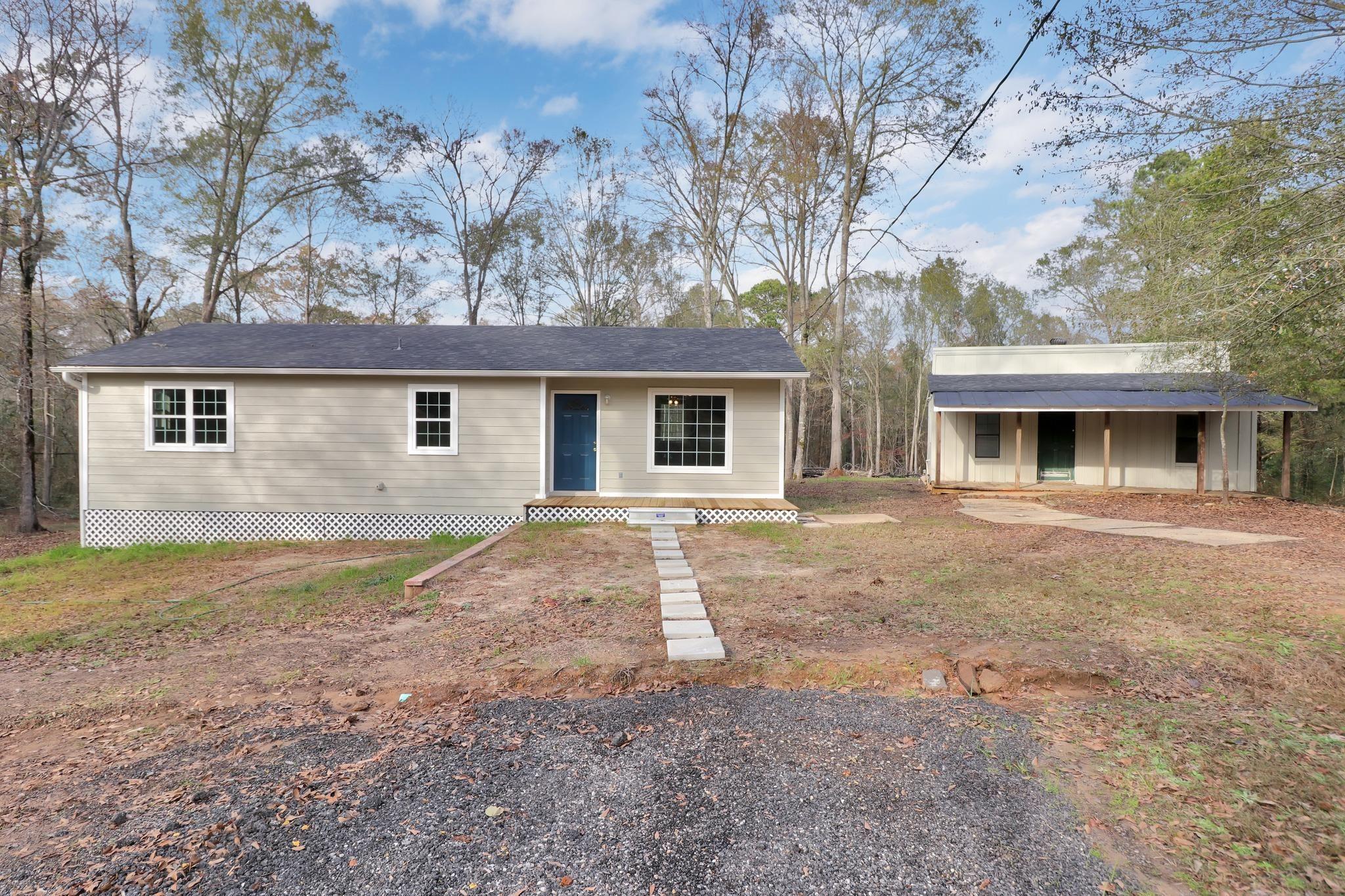 Image 0: View of front of home featuring covered porch, Front Of Structure