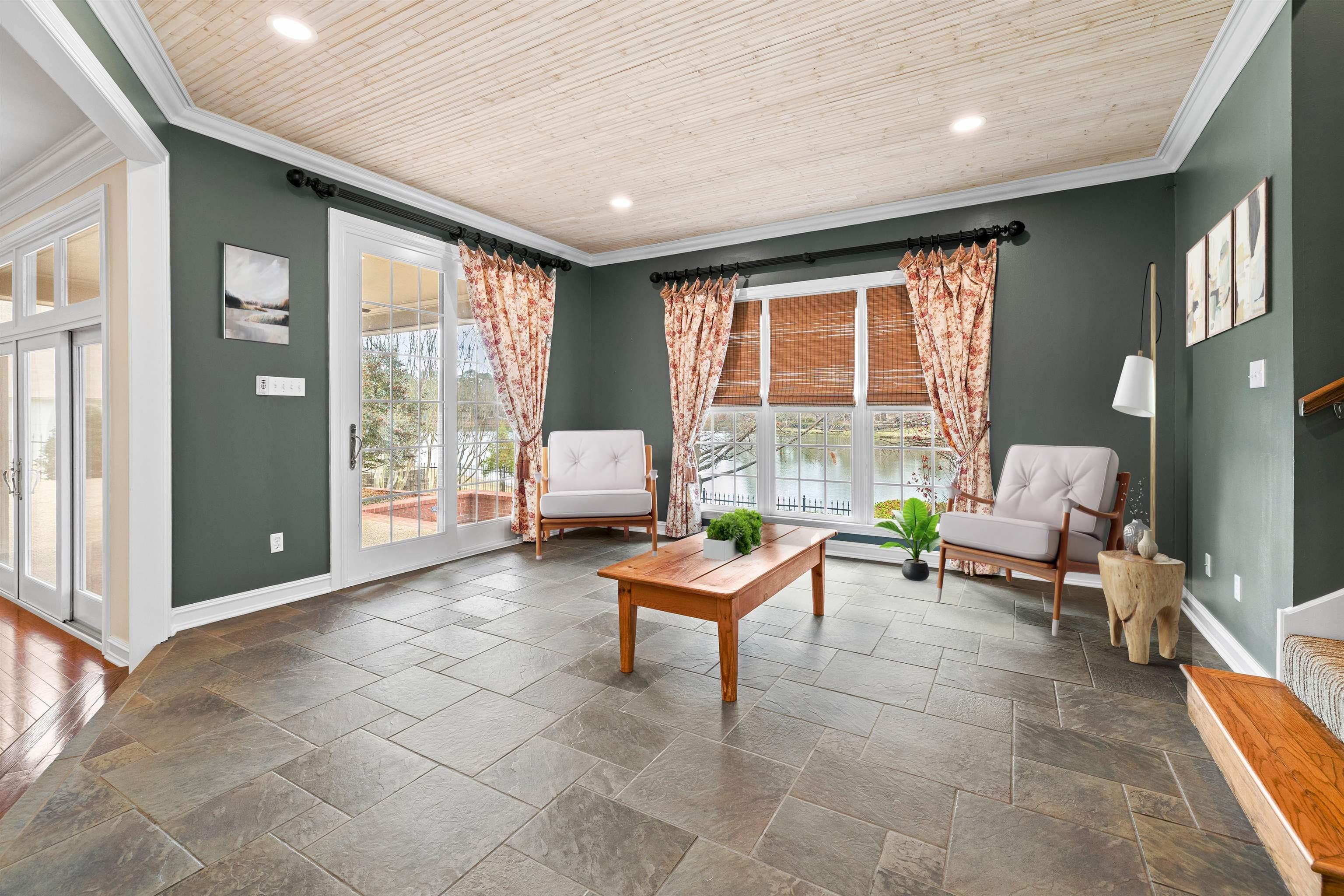 Image 3: Sitting room featuring recessed lighting, stone tile floors, plenty of natural light, and ornamental molding, Sitting Room